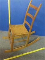 antique ladder back chair made into a rocker