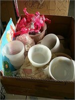 Box of pink flamingos and vases