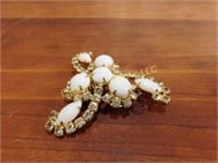 brooch pin, white stones