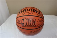 Two autographed basketballs