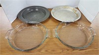 Glass pie pans and 2 metal pans