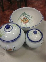 Set of 3 ceramic bowls with fishes on them