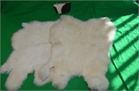 PAIR RABBIT PELTS AND COWHIDE COIN PURSE