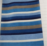 Small blue stripped rug