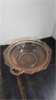 Pink depression glass bowl with handles