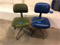 Pair of office chairs on casters