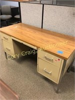 Small metal desk with drawers