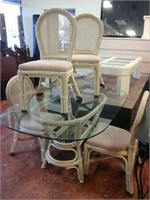 Glass top wicker table with 4 chairs