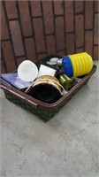 Casserole basket with assorted household items