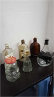 Vintage glass liquor decanters and assorted jars