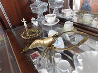 Contents of Shelf-CandyDishes, Brass Candlesticks,