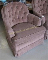 Brown upholstered arm chair