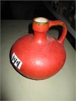 red pitcher vase