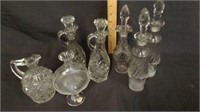 7 GLASS CRUETS; (2) MISSING STOPPERS( SOME CHIPS)