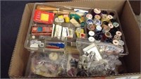 GROUP OF SEWING ITEMS; THREAD, NEEDLES, BUTTONS,