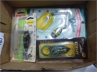 Box w/ 4 new fishing lures