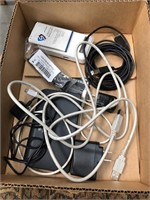 Box of miscellaneous cables/chargers