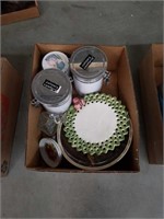 Box of canisters and plates
