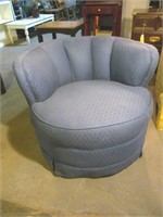 Swivel upholstered blue stool