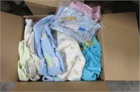 Box of little girl's clothing