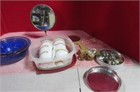 Blue bowls, Pyrex mugs and cookie cutters