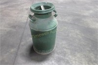 Milk can painted green