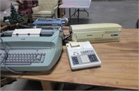 2 Electric typewriters, copier, adding machine