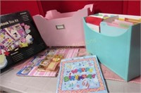 Scrapbooking supplies and cards in wooden crate