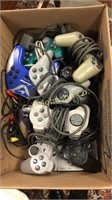BOX OF VIDEO GAME CONTROLLERS