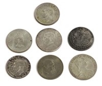 (7) GROUP OF WORLD DOLLAR SIZE COINS