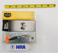 Lot #56 - (4) knives all (nib): Buck, NRA, Wolf