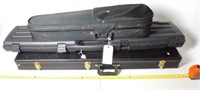 Lot #128 - Hard plastic rifle case, guitar case