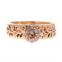 A Lady's 14K Diamond Solitaire Filigree RIng
