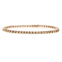 A Lady's "S" Link Diamond Bracelet in Gold
