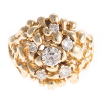 A Lady's Diamond Dome Ring in Gold