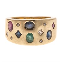 A Lady's 18K Multi Stone Wide Band