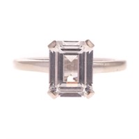 A Lady's 14K Emerald Cut White Sapphire Ring