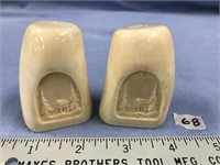 Pair of relief carved ivory whale's teeth salt and