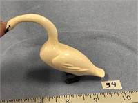 Choice on 2 (34-35):  4" ivory swans by Daniel Iya