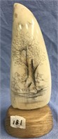 Whale's tooth 5" tall, scrimshawed with some beave
