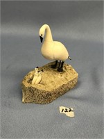 Walrus ivory goose with 3 small goslings set on wh