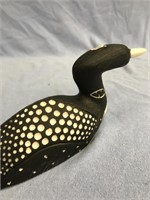 8" Fossilized ivory loon with exquisitely scrimmed