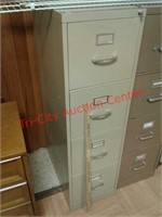 > 4 drawer locking metal file cabinet w/ key -