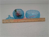 2 blue glass dishes