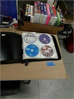 Binder full of DVDs. Approx. 128 discs