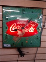Vintage lighted Coca-Cola Clock Works per seller