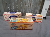 3 assorted advertising boxes
