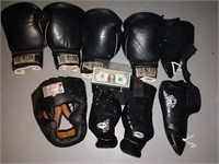 Lot of boxing gloves pads and face mask