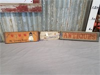 3 wooden signs