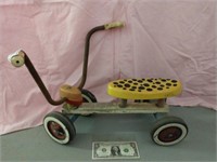 Vintage child's wooden ride-on toy